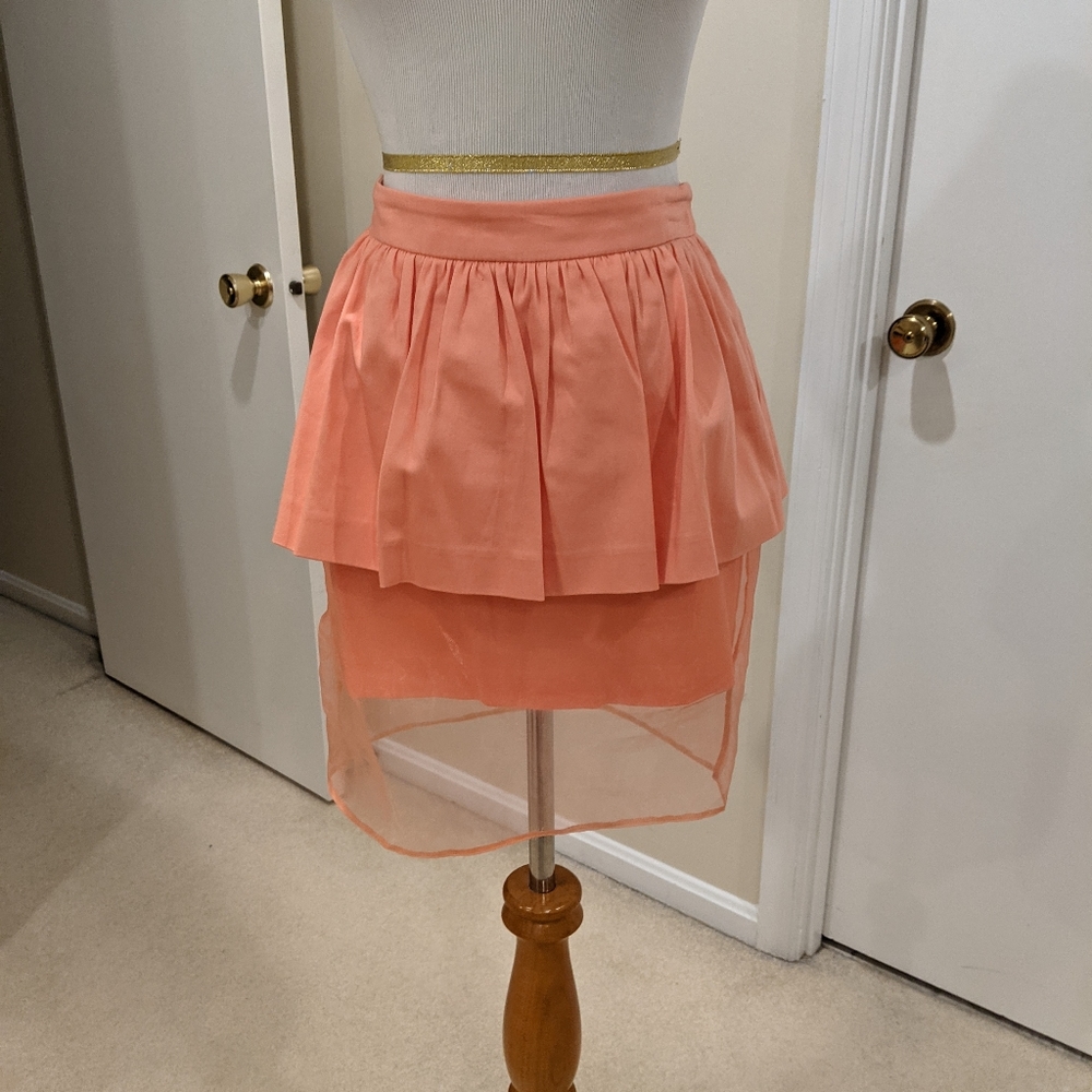 Orange pastel peplum and mesh skirt